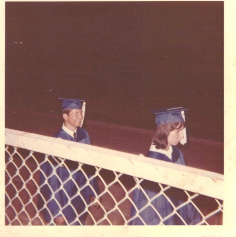Graduation:  Mike Mayben on the left.  According to the Graduation Program, Linda Matthews is the person ahead of Mike; but Linda has blonde hair in the yearbook.